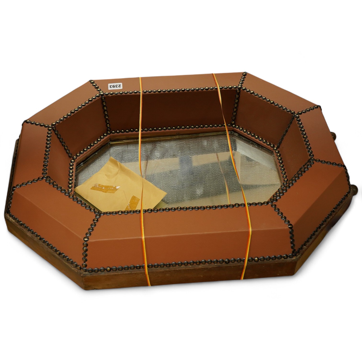 A leatherette mounted octagonal easel mirror, 68cm